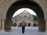 Kathy in the archway in front of Stanford's main quad
