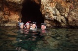 Intrepid snorkelers in front of treasure cave.