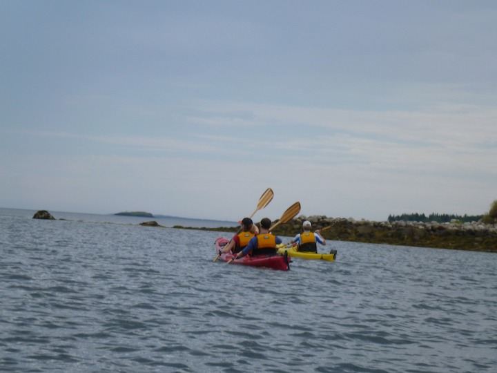 Hollie, Ross, and guide John paddle