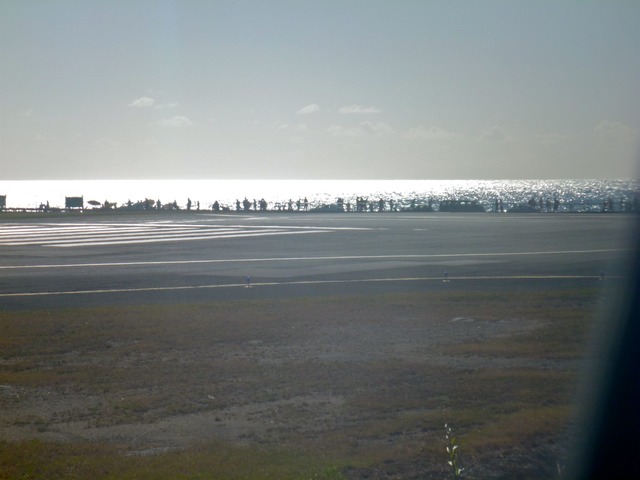 Spectators watching landings at Princess Juliana airport