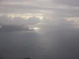 Brilliant sunlight through the clouds: Brewer's Bay on the north shore of Tortola.