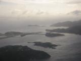 Airport runway on left, Fat Hog's Bay behind (above) it, then Buck Island.  Behind and to the right of Buck Island is Maya Cove, Sunsail's marina.