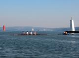 Two fours on the inlet.  Note the left on ie four single oarsmen, the right one has four PAIRS and a cox facing forward (you can just see his head).