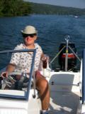 Kathy navigates the inlet, iced tea in hand.